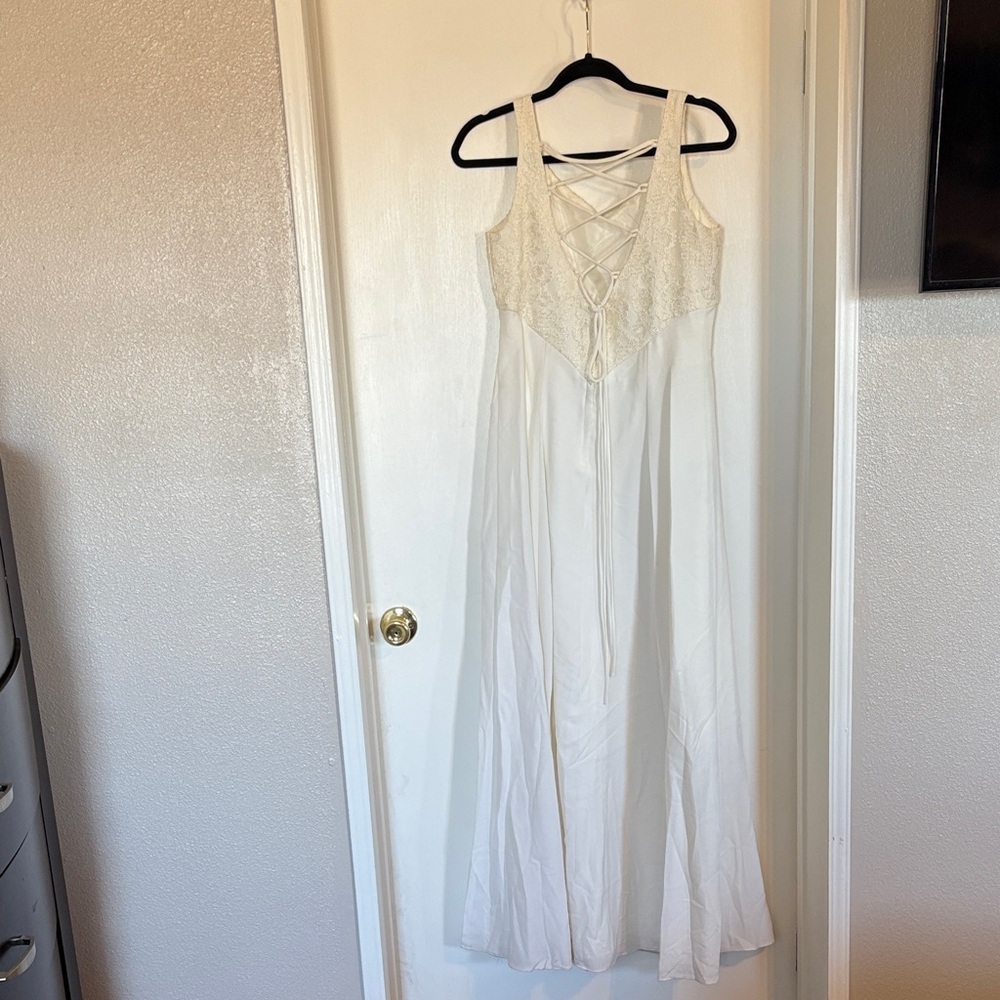 Wedding dress with lace top. Zip back with tie. Bridal Originals size 12